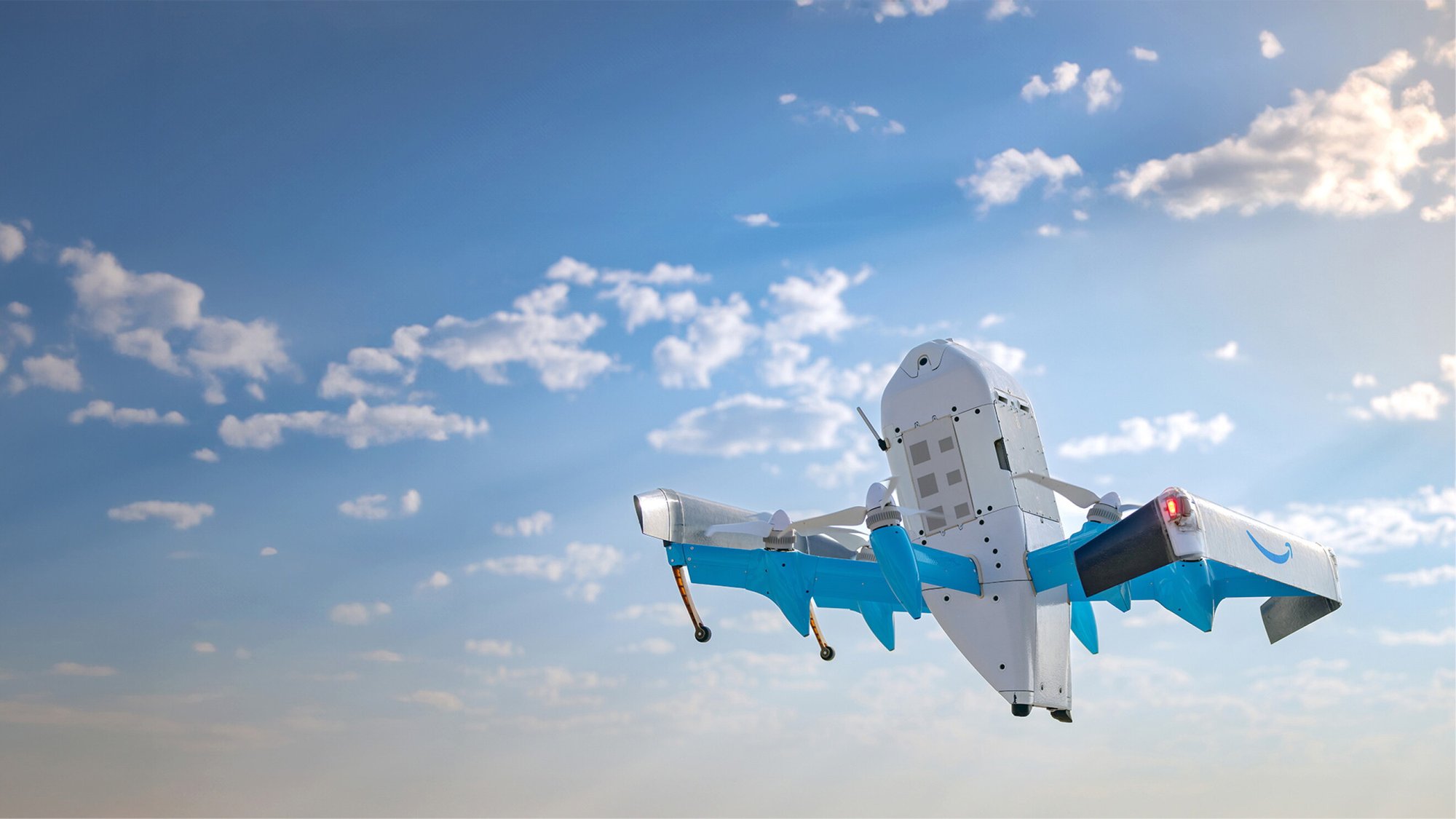 Hero image for Amazon wants to fly up to 1,000 delivery drones a day out of North Haven. Here's where it stands. Photo courtesy of Amazon.