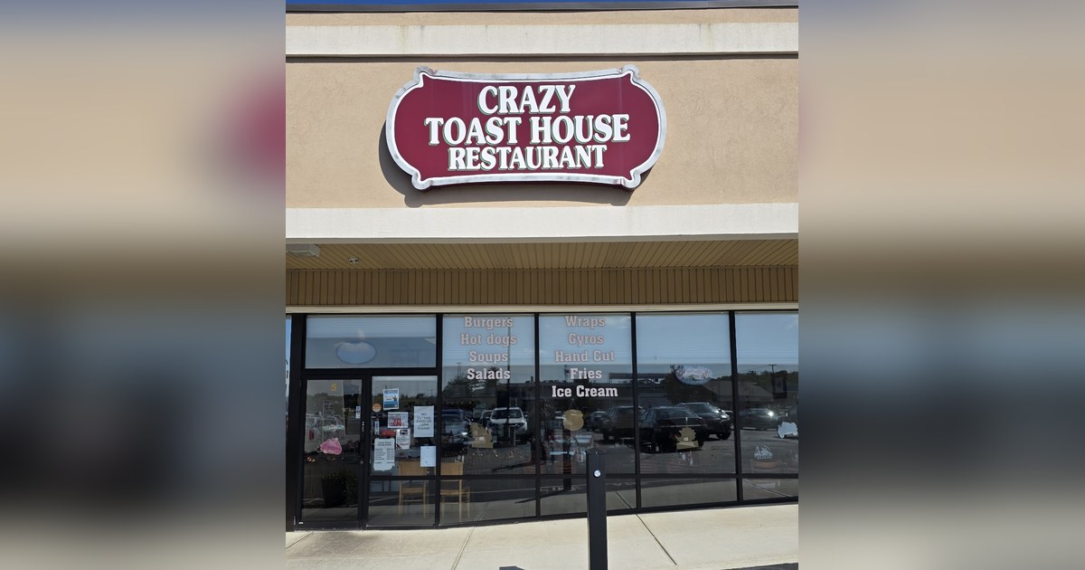 The burgundy Crazy Toast House Restaurant sign over the glass storefront at 117 Washington Ave. in North Haven