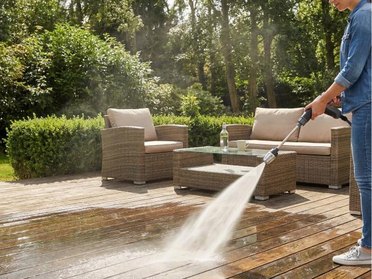 Jetterix nozzle on a garden hose cleaning a patio
