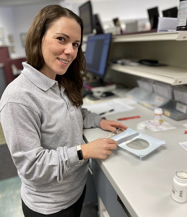 Pharmacist Lisa C. Awugah at work at North Haven Pharmacy