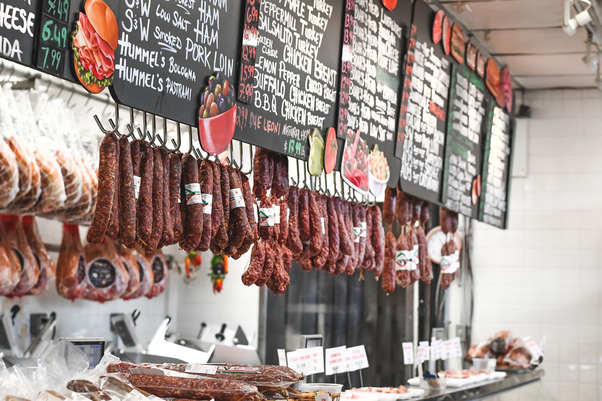 Salami hanging above the deli counter at Liuzzi Gourmet Food Market