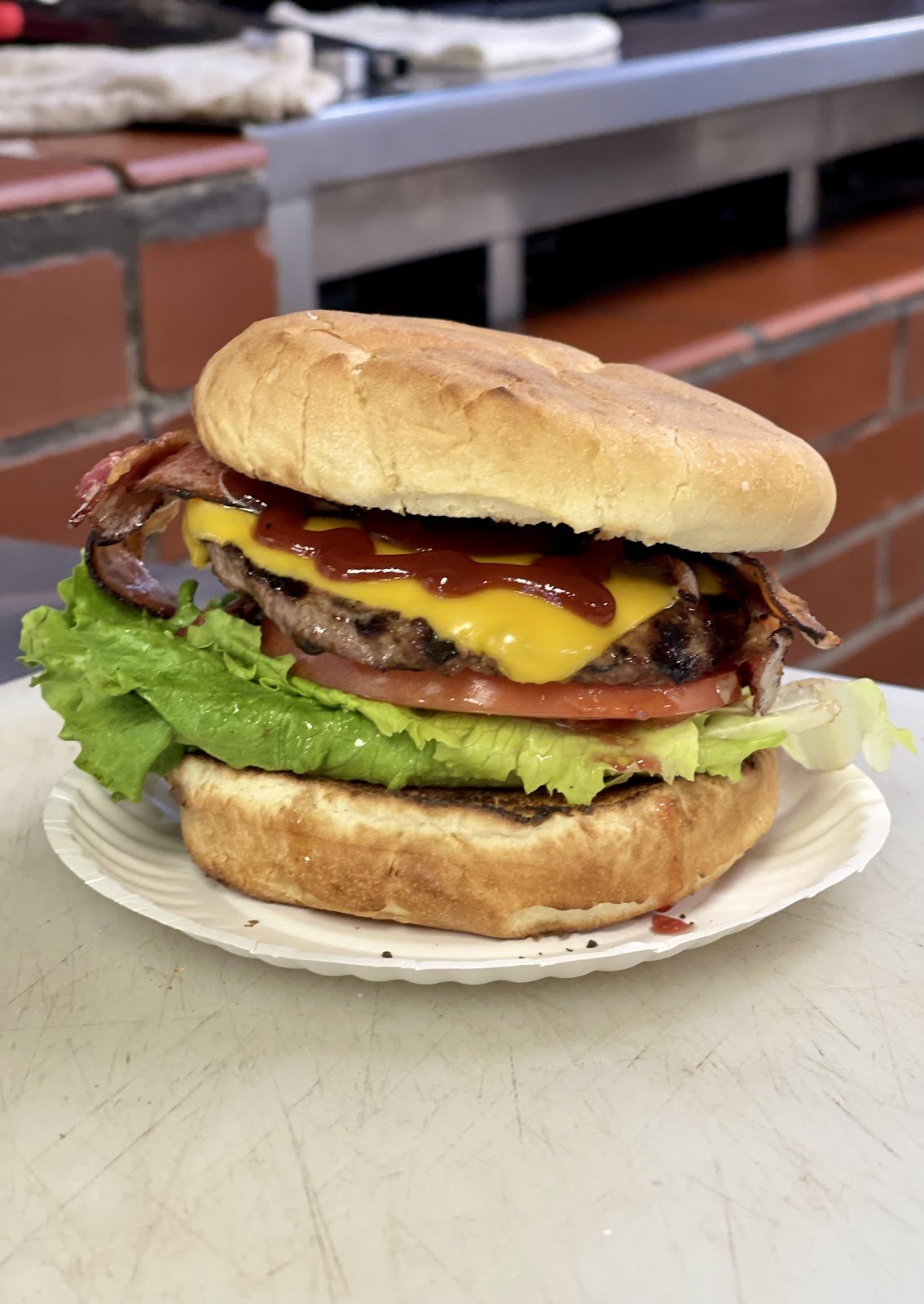 A bacon cheeseburger at Nick’s Char Pit